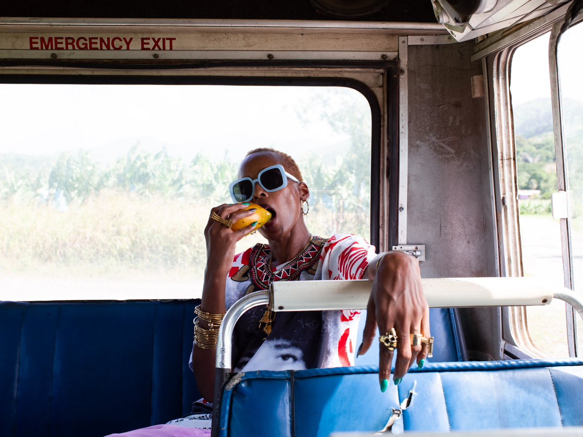 Angela Hunte riding a bus in Trinidad and Tobago