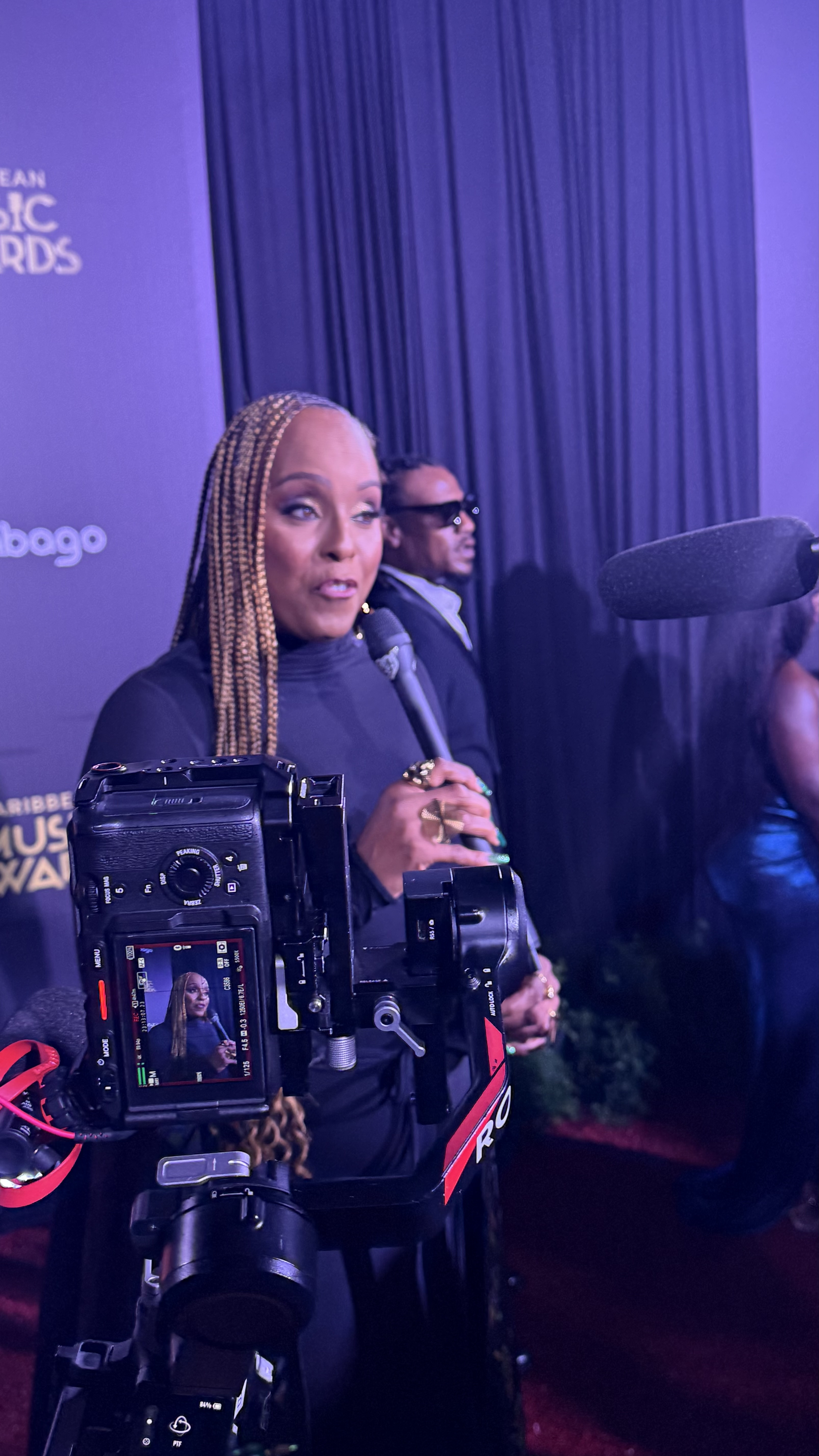Angela Hunte speaking with media at the Caribbean Music Awards
